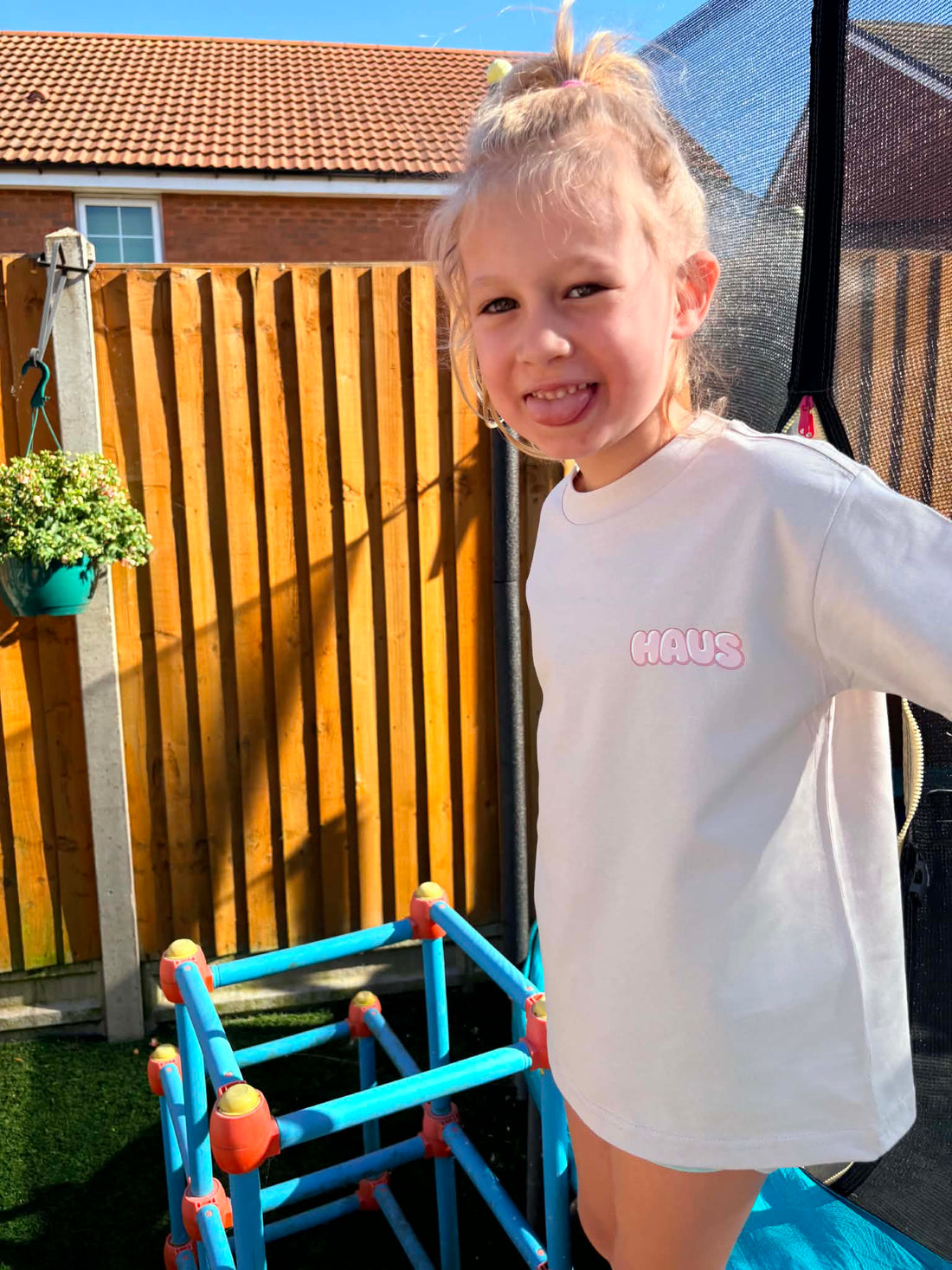 Child in CalmHaus tee