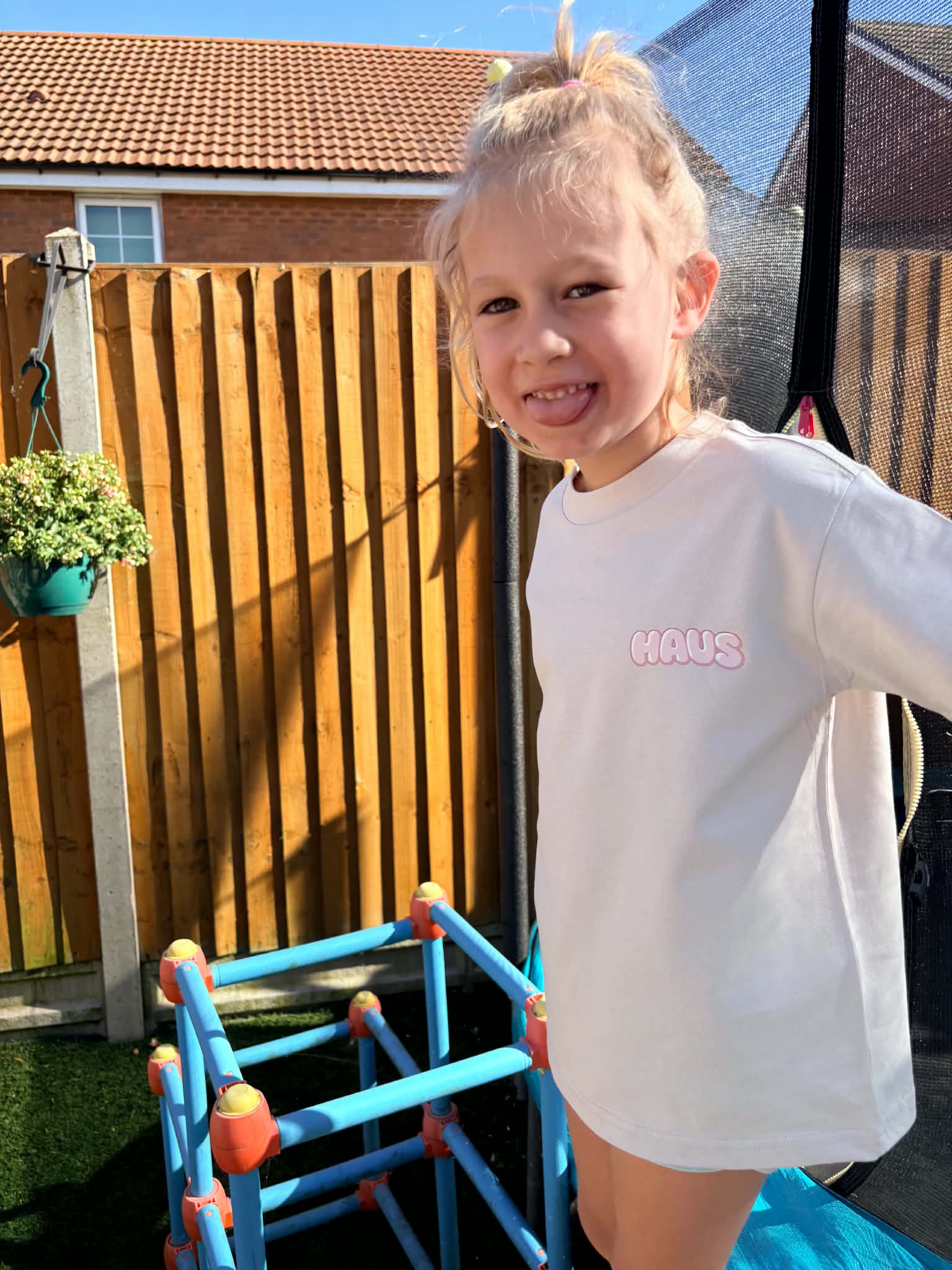 Child in CalmHaus tee